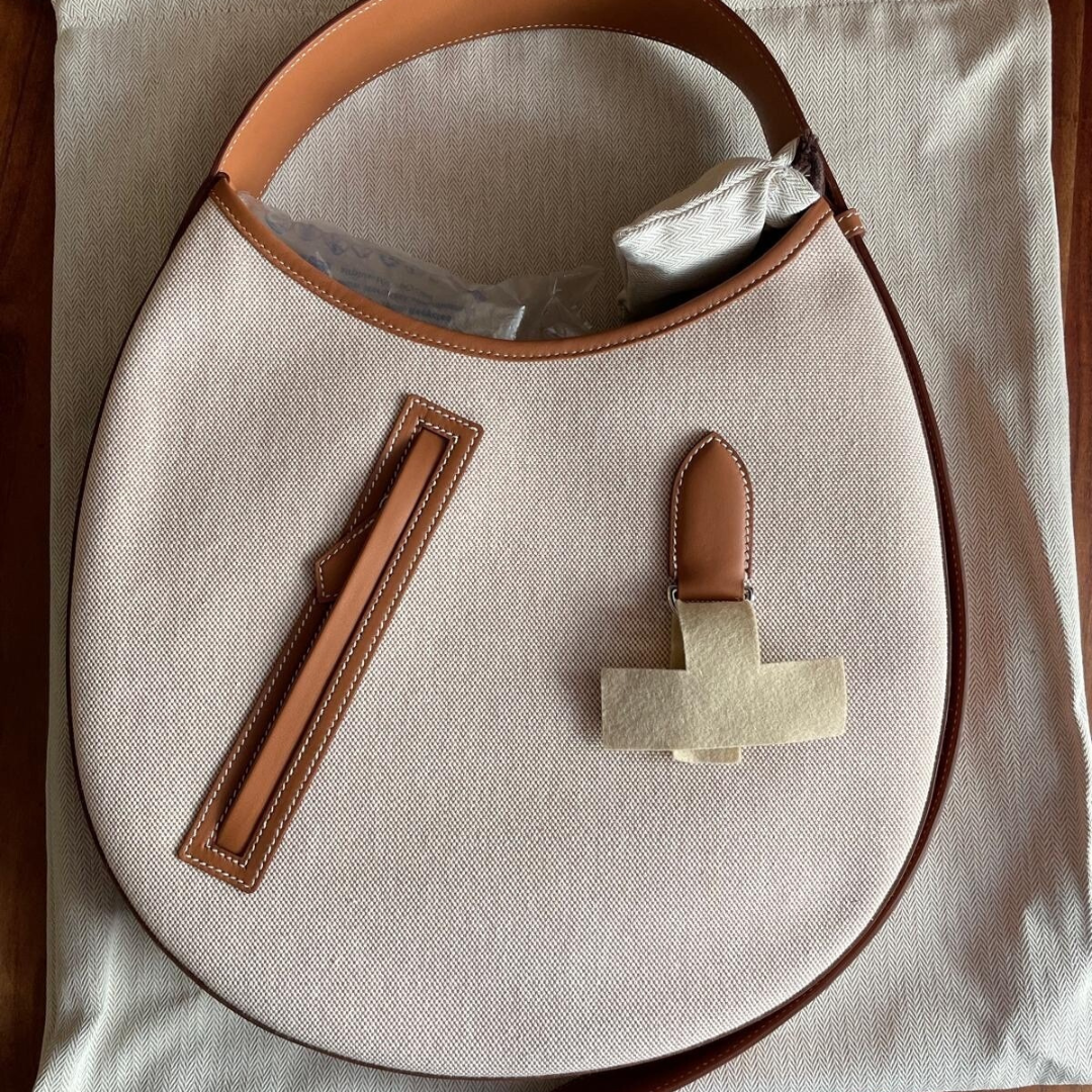 SMALL SADDLE BAG MADE OF FABRIC AND LEATHER BY HERMÈS