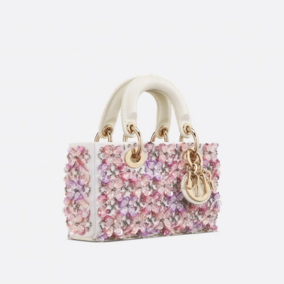DIOR LADY D-JOY MICRO BAG MADE OF WHITE CALF LEATHER WITH PINK FLOWER EMBROIDERY AND RHINESTONES