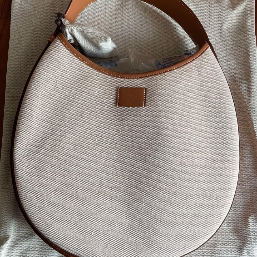 SMALL SADDLE BAG MADE OF FABRIC AND LEATHER BY HERMÈS