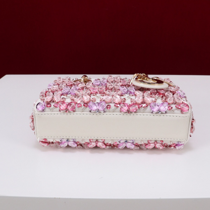 DIOR LADY D-JOY MICRO BAG MADE OF WHITE CALF LEATHER WITH PINK FLOWER EMBROIDERY AND RHINESTONES