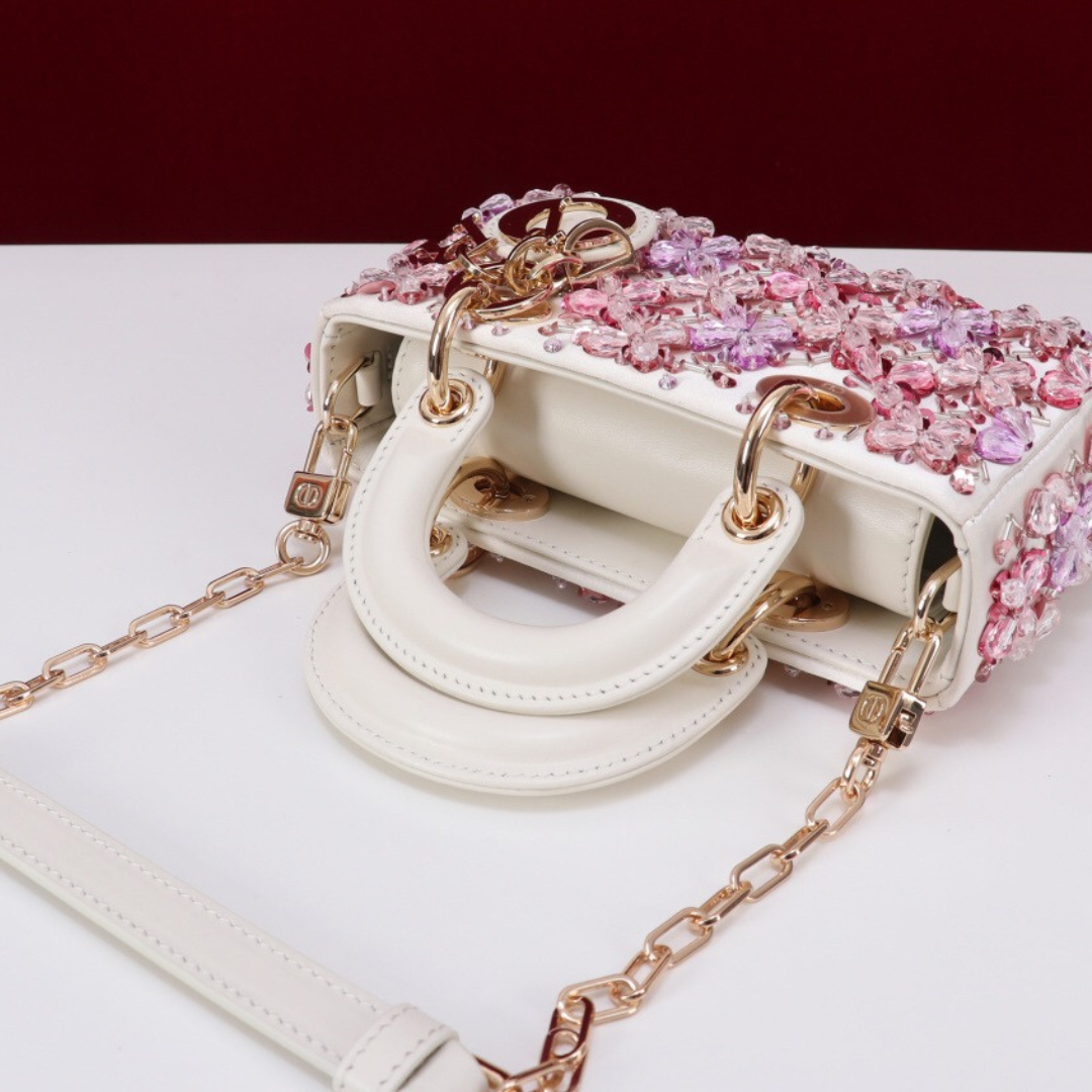DIOR LADY D-JOY MICRO BAG MADE OF WHITE CALF LEATHER WITH PINK FLOWER EMBROIDERY AND RHINESTONES