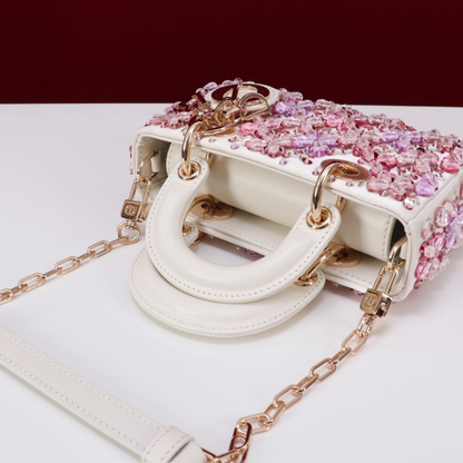 DIOR LADY D-JOY MICRO BAG MADE OF WHITE CALF LEATHER WITH PINK FLOWER EMBROIDERY AND RHINESTONES