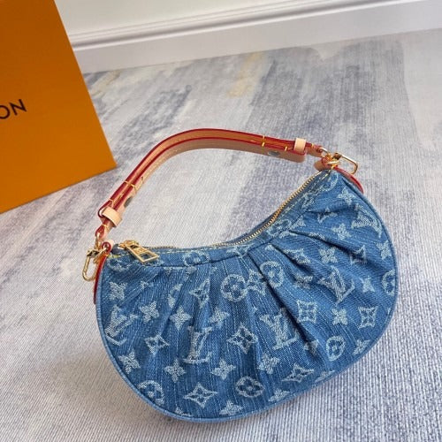 LOUIS VUITTON HAND BAG MADE OF MONOGRAM DENIM